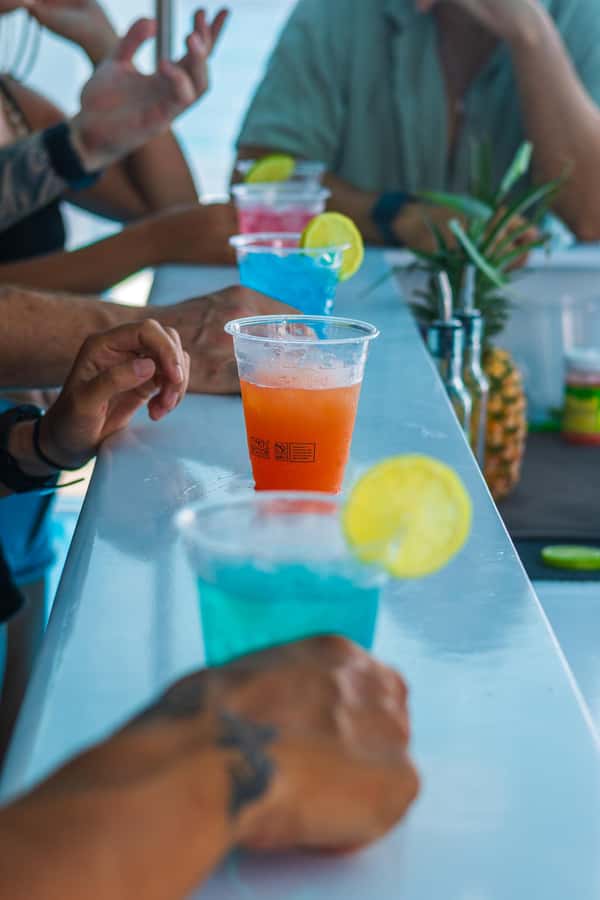 Board from Waikiki Beach for our Aloha Hour Sail - Where you meet Hawea on Waikiki Beach, behind Duke Kahanamoku