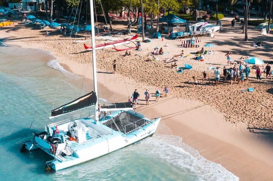 Board from Waikiki Beach: Scenic Sunset Sail on the Hāwea - Honolulu Coast after dark: moonlit sailing and possible wildlife moments