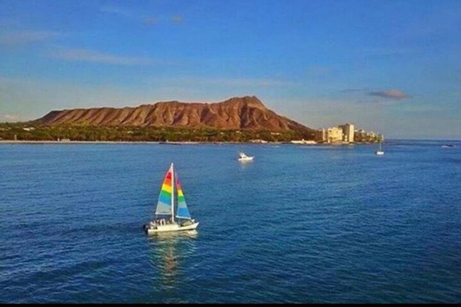 Board from Waikiki Beach: Scenic Sunset Sail on the Hāwea - Drinks and music: what you get standard, and what Premium adds