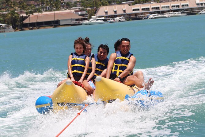 Combo Banana Boat Ride and Bumper Tube Ride in Hawaii - The Banana Boat Tow: Twists, Holds, and a Quick Rescue Plan