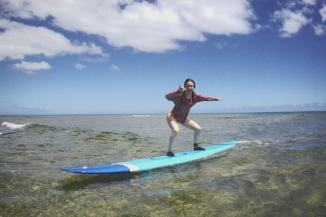 Group Surf Lessons for beginners on the North Shore of Oahu - The lesson actually starts with pop-up practice
