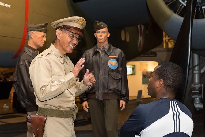 Hangar Guided Tour - Hangar 79: bullet holes you can still see, plus the restoration shop view
