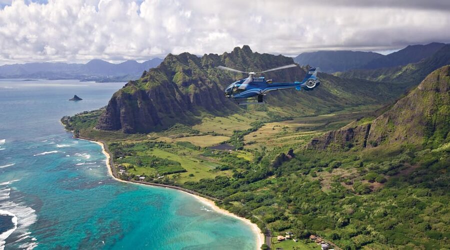 Honolulu: Blue Skies of Oahu Helicopter Tour - Kaneohe Bay coral formations and the Nuuanu Valley rainforest cliffs