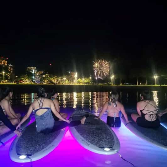 Honolulu: Fireworks Glow and Flow Yoga Class - Glow Yoga on Honolulu Water, With Light Under Your Board