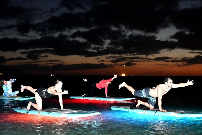 Night SUP Yoga in Honolulu, Hawaii - The SUP basics: learning your balance on dark water