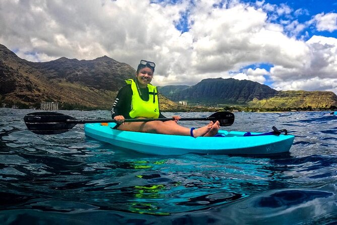 Oahu Dolphin and Snorkel Tour with Waikiki Pickup & Lunch - The onboard fun: 20-foot water slide, paddle boards, and kayaks