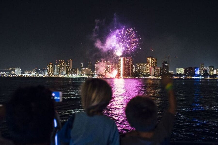 Oahu: Waikiki Friday Night Fireworks Cruise - The glass-bottom viewport: spotting fish pulled toward the lights
