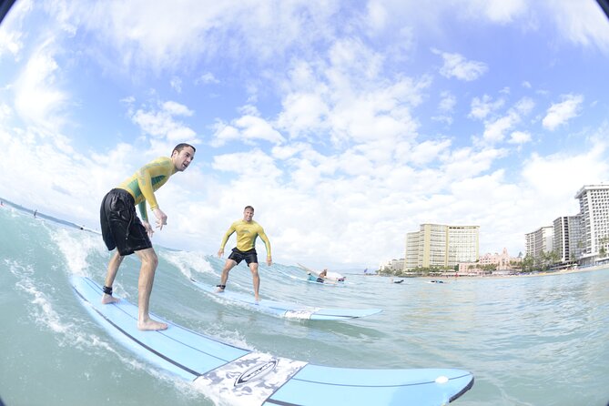 Semi-Private Surf Lesson for 2 or 3 people on Waikiki Beach - Land Demonstration: Board Basics, Paddling, and Catching Waves