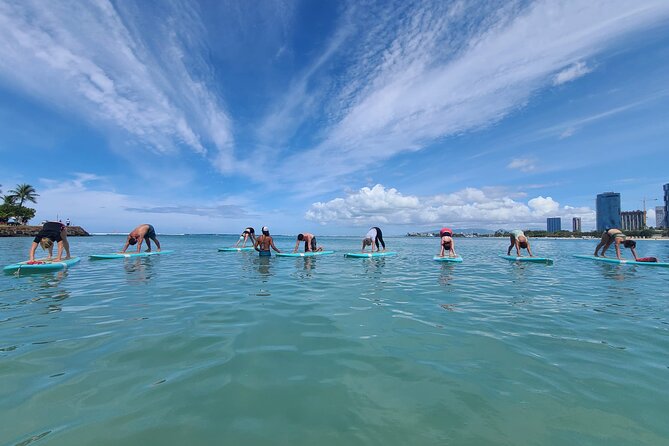 Stand-Up Paddle Yoga - Restorative positions and savasana on a floating surface