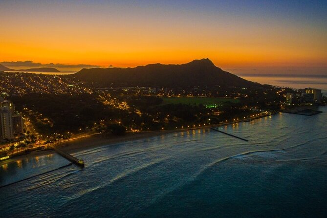 Sunrise Breakfast Cruise in Honolulu - Waikiki Beach from offshore: calm water, big pictures