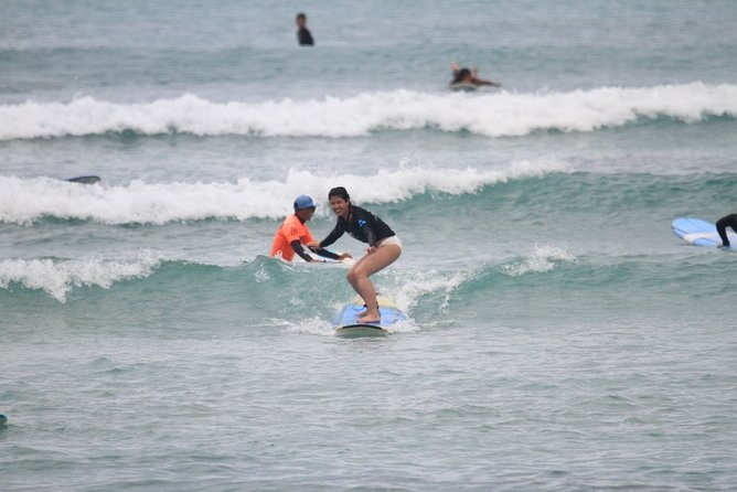 Surfing Lessons On Waikiki Beach - The Water Time: Standing Up With an Instructor Beside You