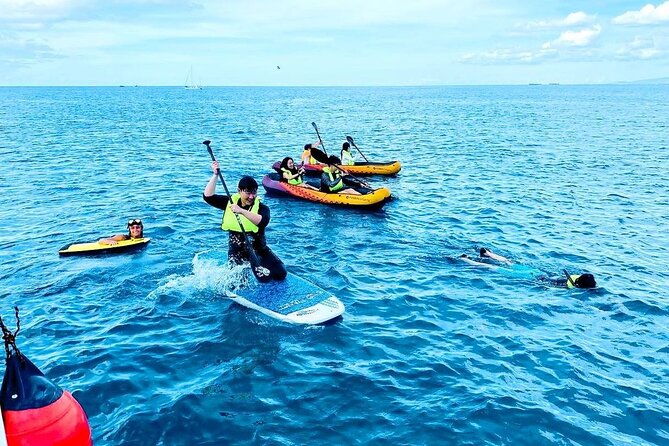 Waikiki Catamaran Escape: Snorkel with Turtles & Water Sports Fun - Water sports after snorkeling: sea scooters and paddle power