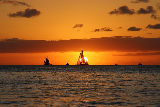 Waikiki Sunset Cocktail Cruise - Hilton Hawaiian Village - Deck or Covered Cabin: Pick Your Comfort Level