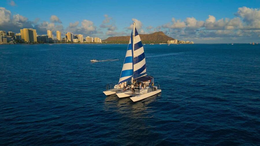 Waikiki: Sunset Swim & Sailing Experience - Key reasons this sunset swim and sail works so well