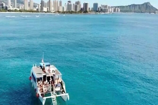 Waikiki Turtle Canyon Snorkeling Adventure - Oceanstar crew details: helpful hands, phone help, and comedy relief
